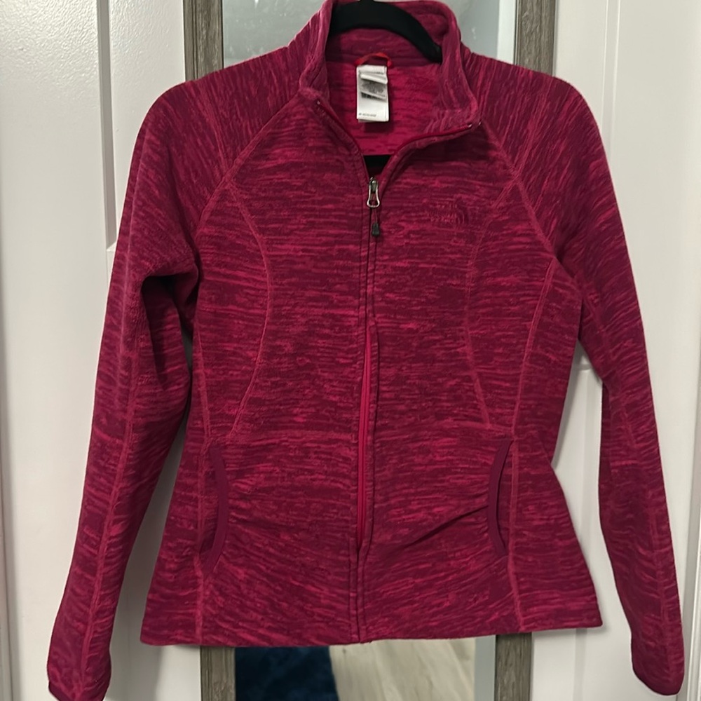 The North Face pink zip up polyester jacket size small!